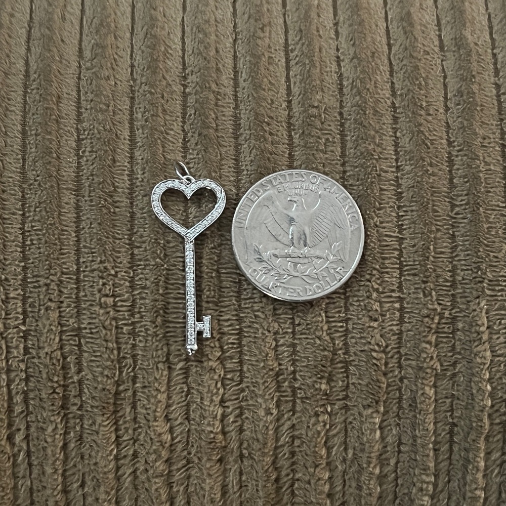 Platinum and diamonds Heart Key Pendant